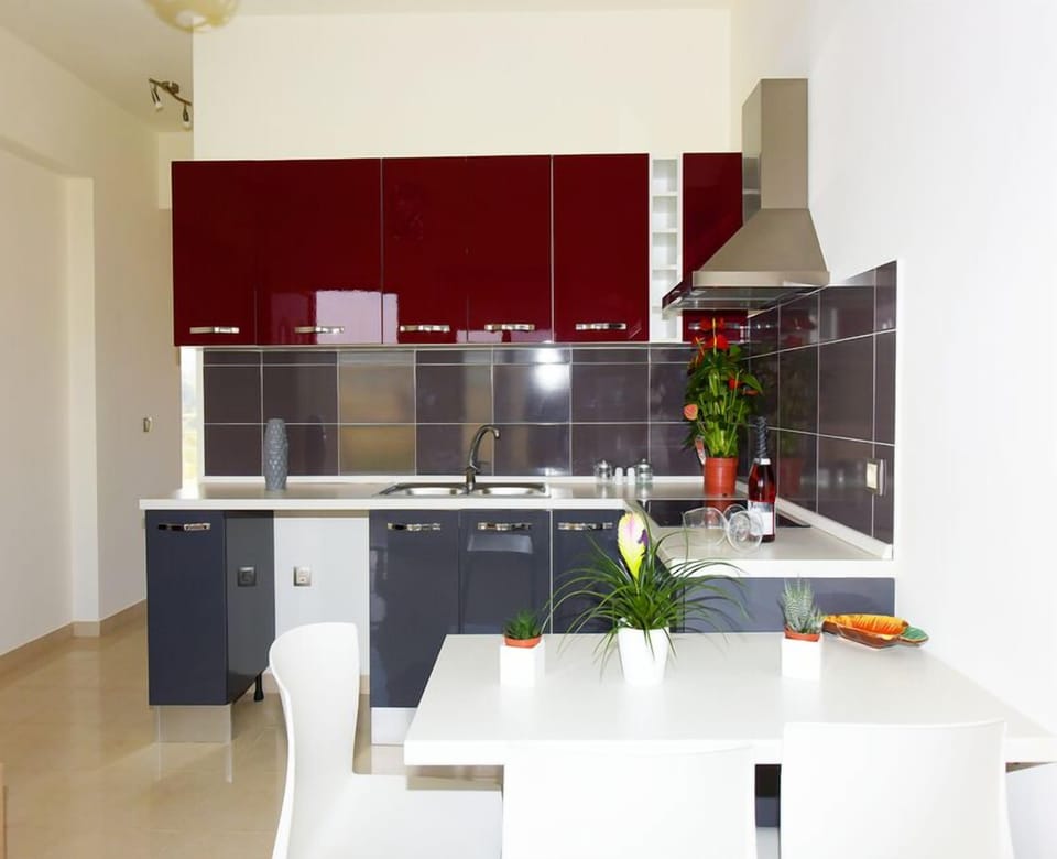 Family Apartment | Desk, blackout drapes, soundproofing, iron/ironing board