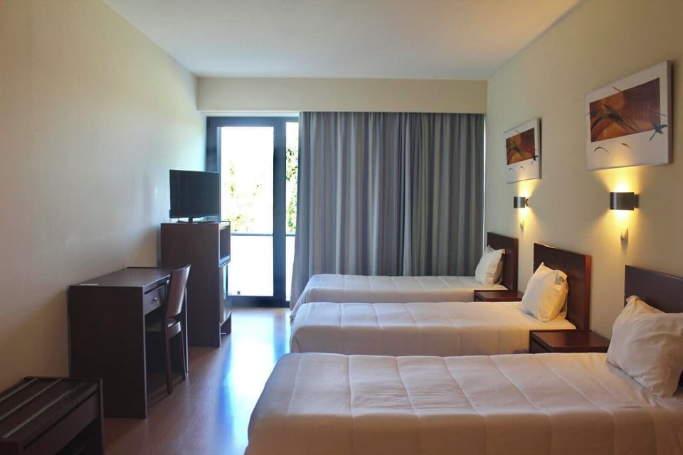 Triple Room | Minibar, desk, laptop workspace, free WiFi