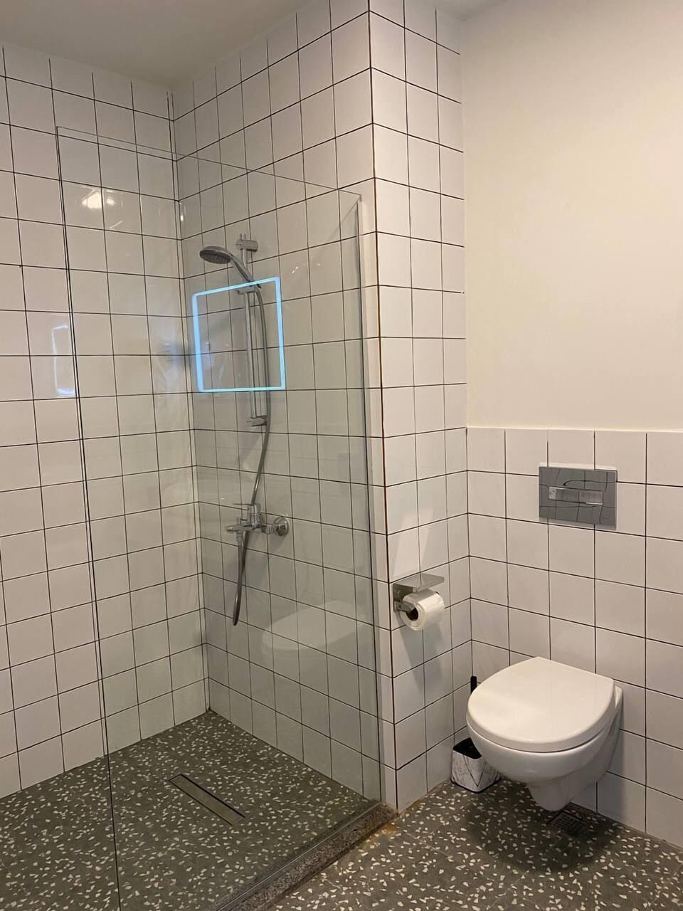 Rainfall showerhead, designer toiletries, hair dryer, towels
