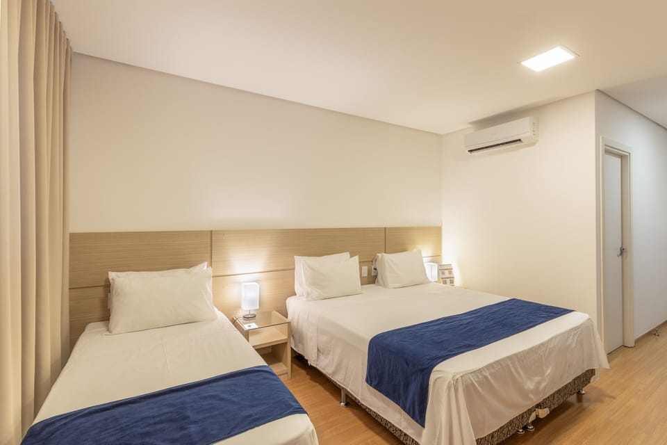 Family Triple Room | Minibar, soundproofing, free WiFi, bed sheets