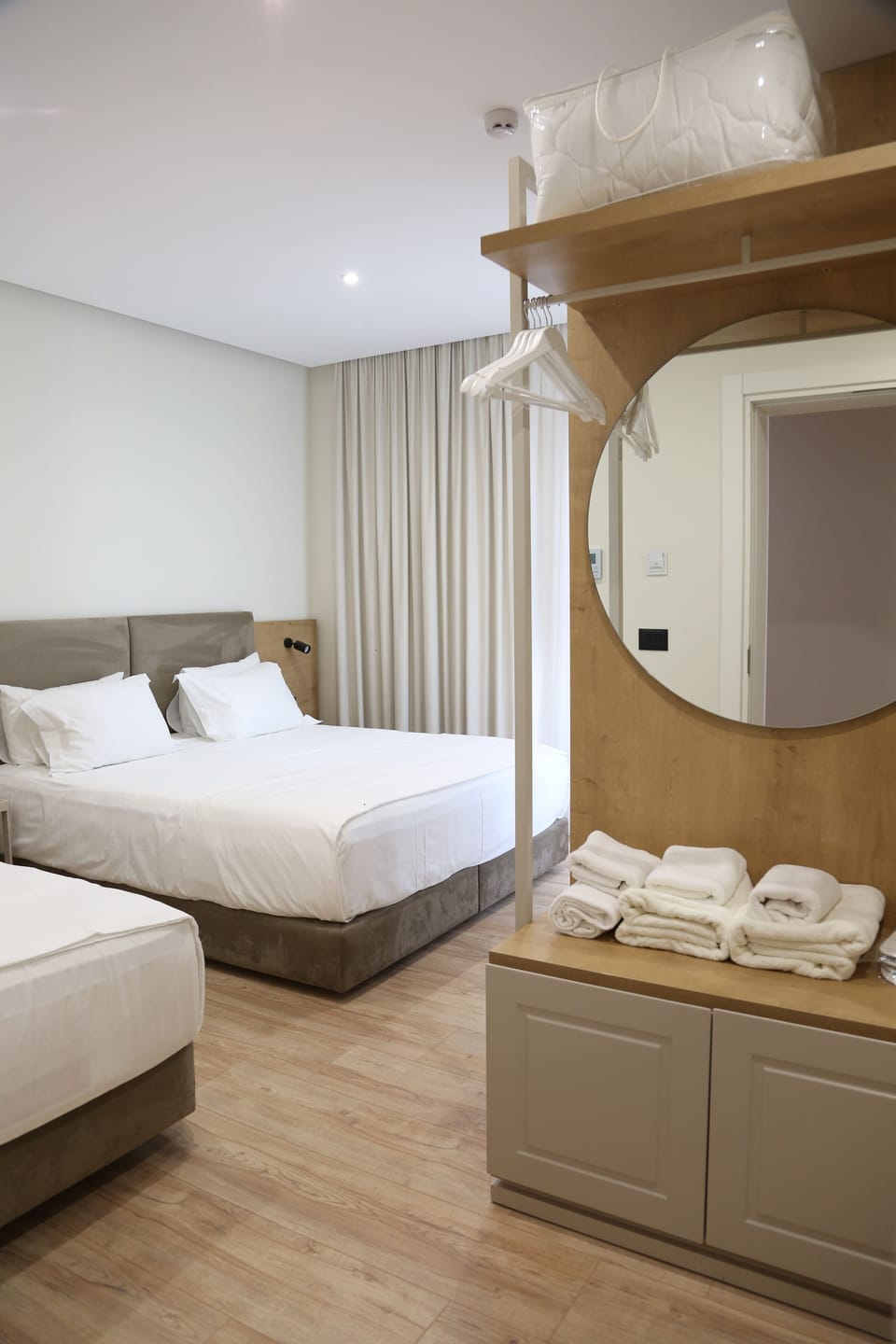 Triple Room, Partial Sea View | Hypo-allergenic bedding, minibar, desk, soundproofing