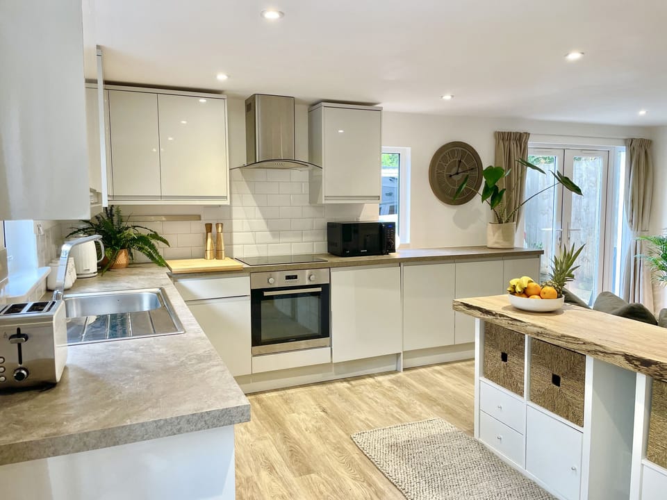 Fridge, dishwasher, electric kettle, cookware/dishes/utensils