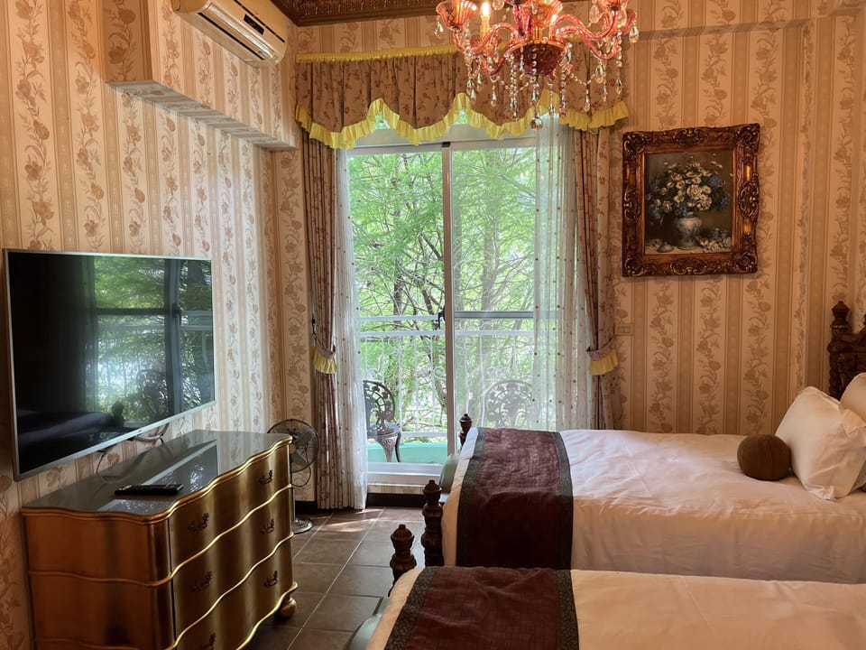 Panoramic Quadruple Room | Minibar, individually decorated, soundproofing, bed sheets