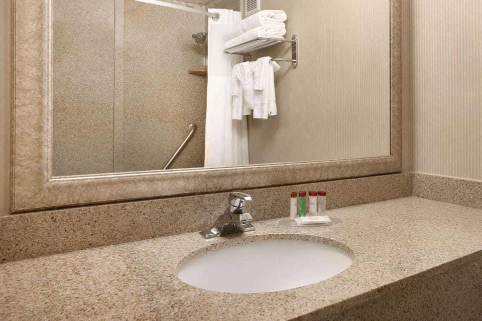 Room, 2 Queen Beds, Non Smoking | Bathroom | Combined shower/tub, eco-friendly toiletries, hair dryer, towels