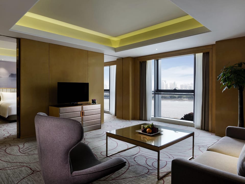 Executive Suite, 1 King Bed, River View, Executive Level | Minibar, in-room safe, desk, laptop workspace