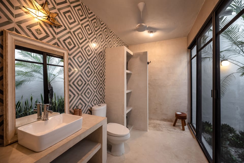 Elite Room, Pool View | Bathroom | Shower, hair dryer, towels, soap