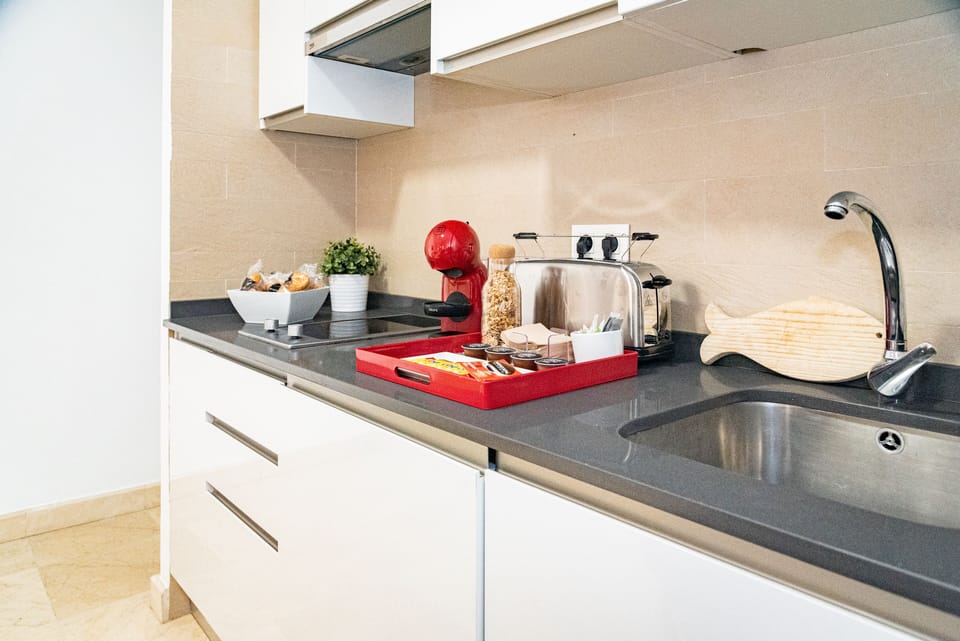 Comfort Apartment | Private kitchen | Full-size fridge, microwave, stovetop, coffee/tea maker