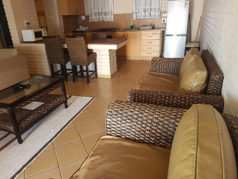 Family Double Room | Living area | 32-inch LCD TV with satellite channels