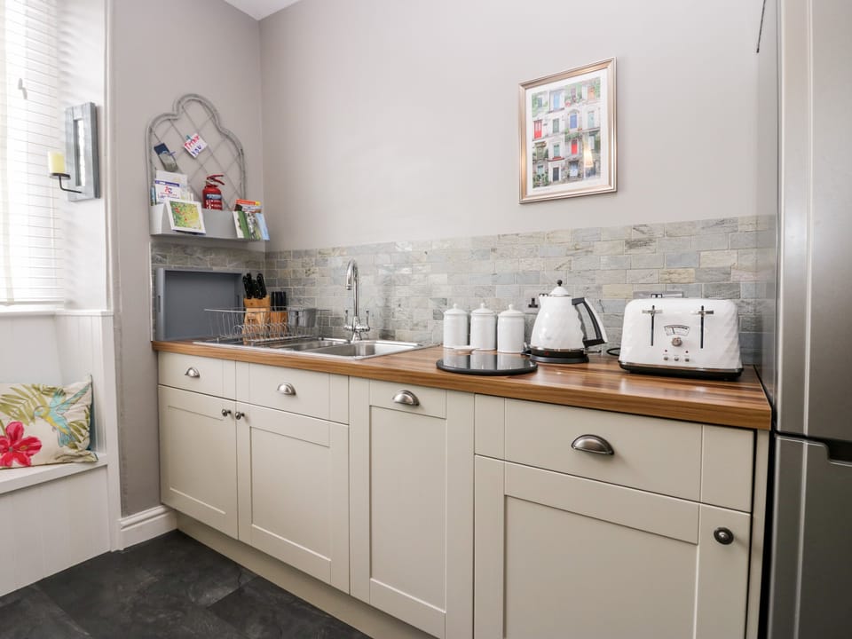 Fridge, dishwasher, electric kettle, toaster