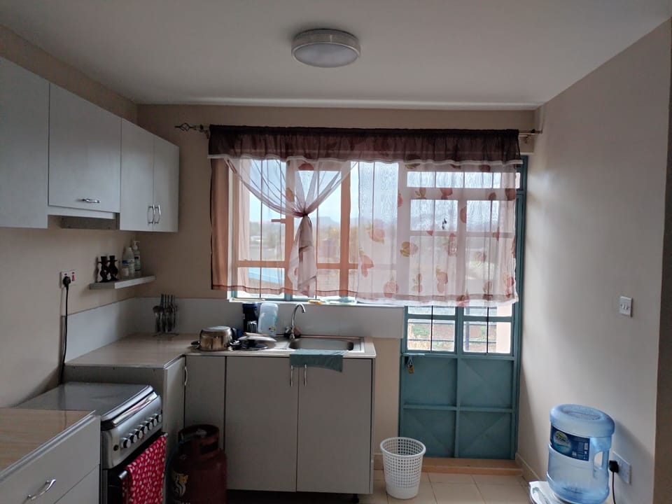 Apartment | Private kitchen | Fridge, microwave, oven, stovetop