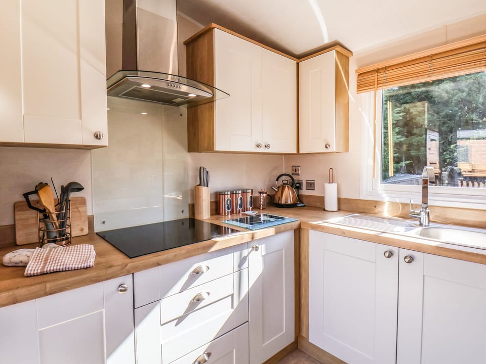 Fridge, electric kettle, toaster, cookware/dishes/utensils