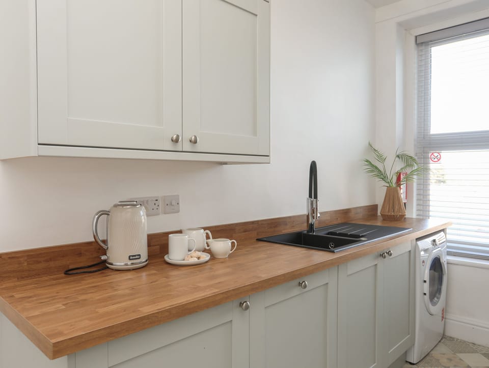 Fridge, dishwasher, electric kettle, toaster