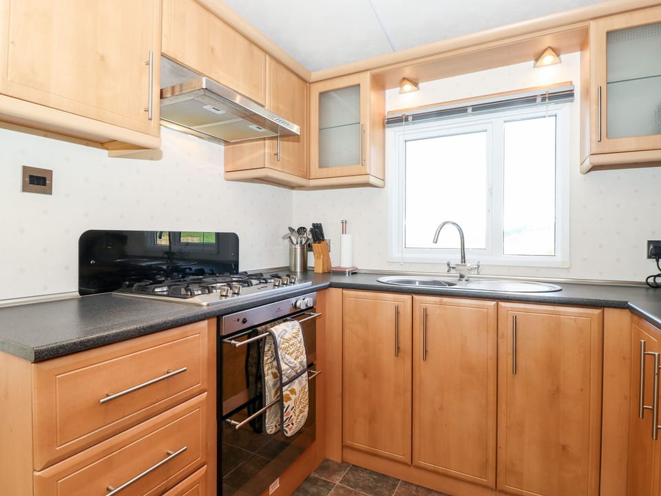 Fridge, electric kettle, toaster, cookware/dishes/utensils