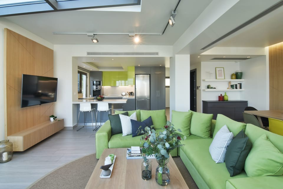 Villa | Living area | 60-inch flat-screen TV with satellite channels, plasma TV, DVD player