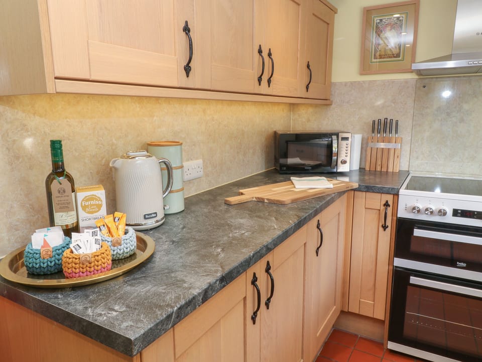Fridge, electric kettle, toaster, cookware/dishes/utensils