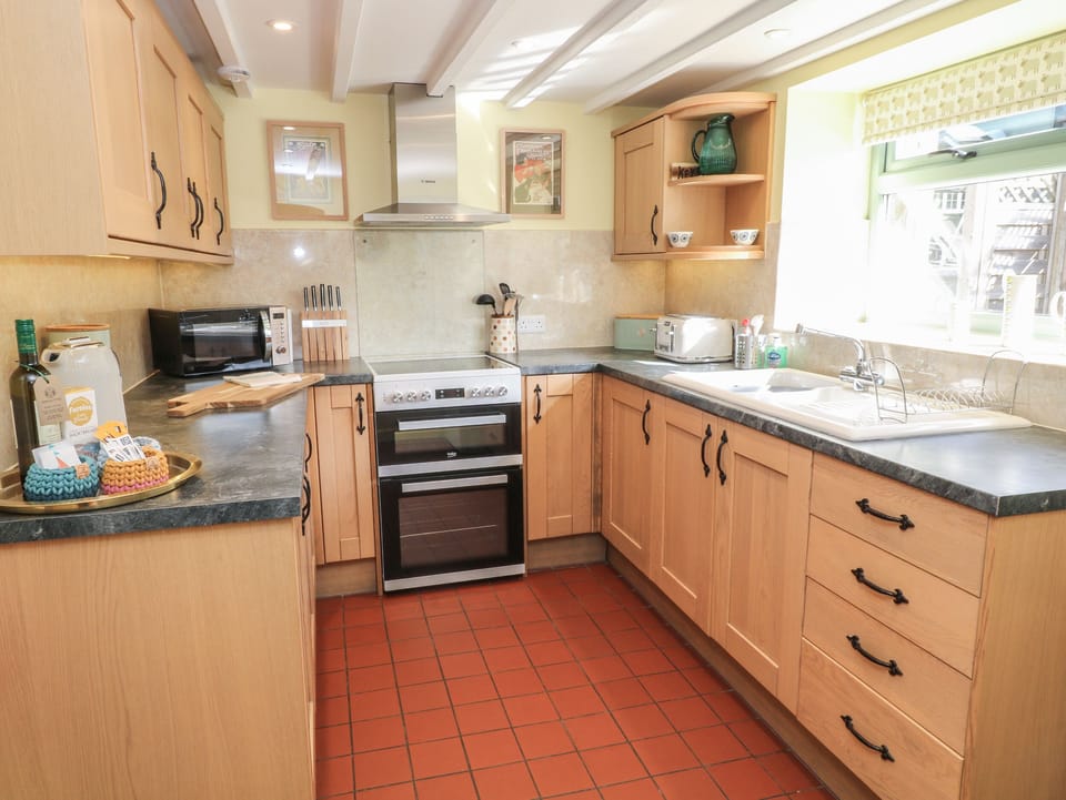 Fridge, electric kettle, toaster, cookware/dishes/utensils