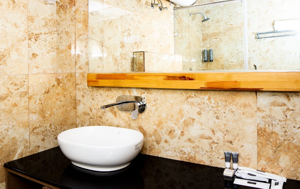 King Family Suite with View | Bathroom | Slippers
