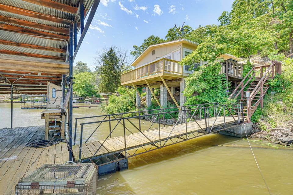 Deck w/ Covered Dock! Lakefront Ozark Cottage Apartment in Lake of the Ozarks