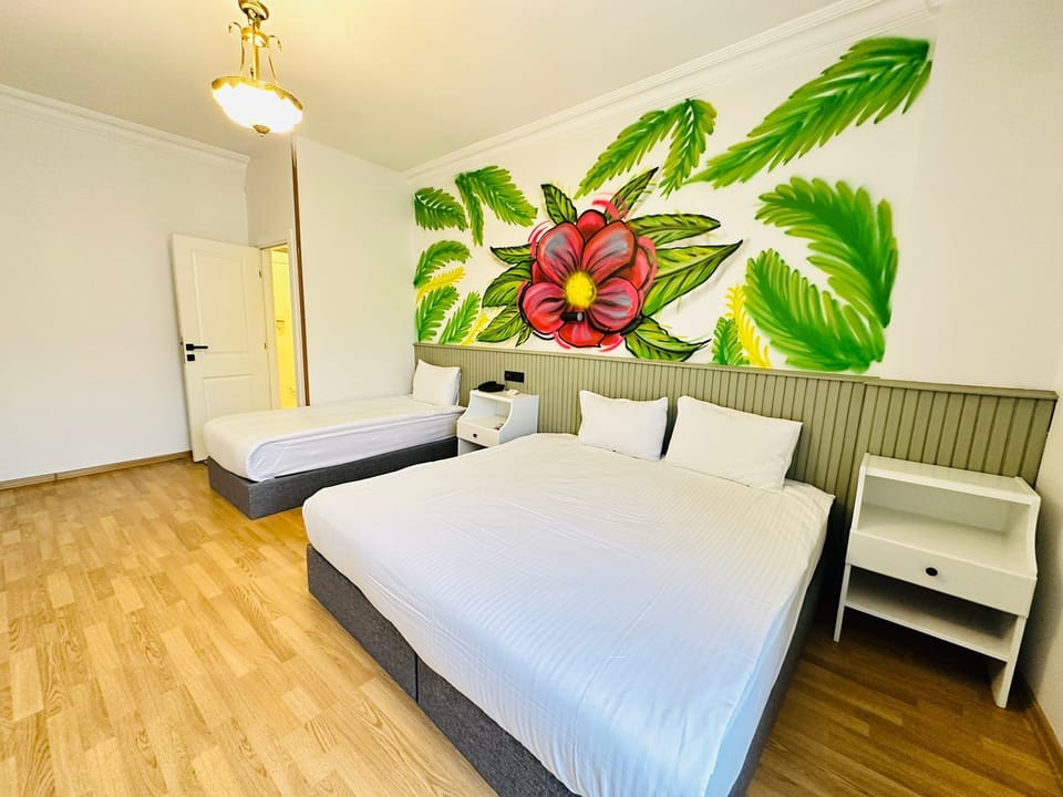 Family Triple Room | Premium bedding, laptop workspace, soundproofing, free WiFi