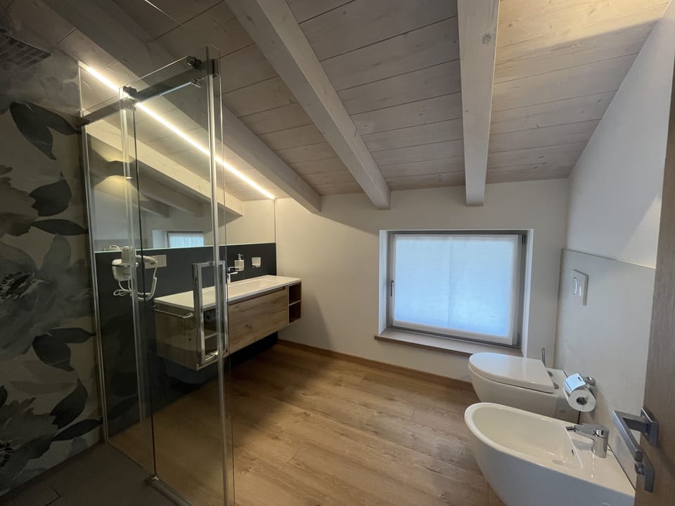 Junior Quadruple Room, Multiple Beds, Terrace, Mountain View | Bathroom | Separate tub and shower, jetted tub, rainfall showerhead