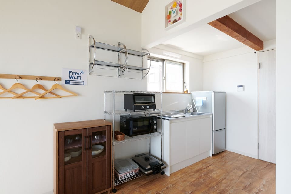 Comfort Villa | Private kitchen | Full-size fridge, microwave, stovetop, electric kettle