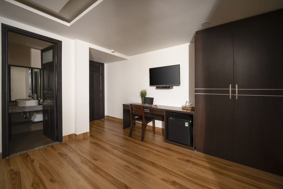 Deluxe Triple Room, Balcony, City View | Egyptian cotton sheets, premium bedding, down comforters, minibar