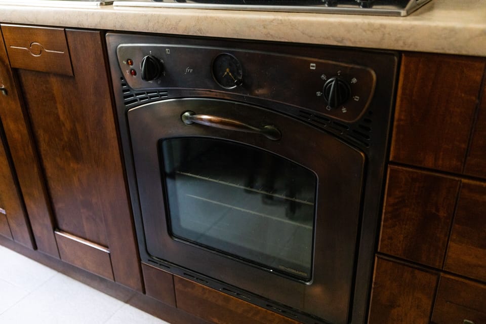 Basic Apartment | Private kitchen | Espresso maker, full-size fridge, oven, dishwasher