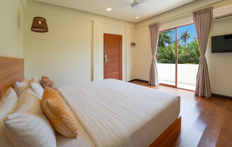Deluxe Double or Twin Room, Garden View | In-room safe, desk, iron/ironing board, free WiFi