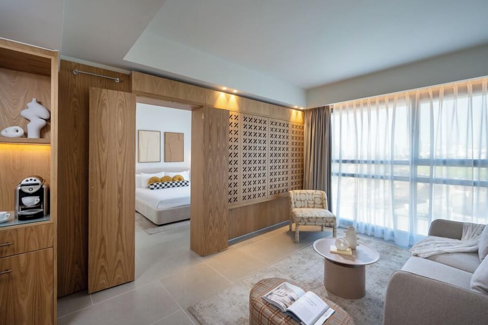 Junior Suite | Living area | Flat-screen TV