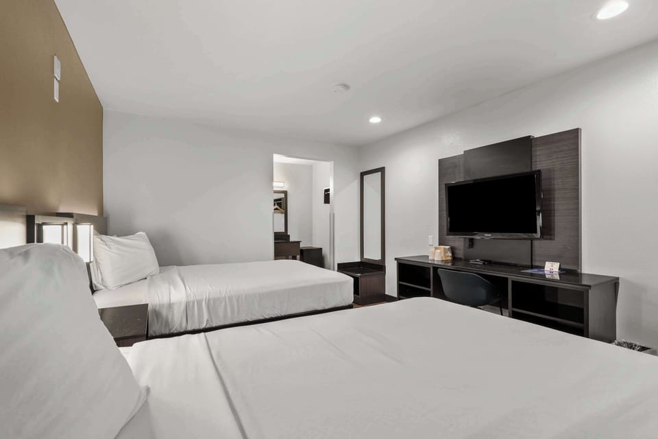 Desk, laptop workspace, blackout drapes, soundproofing