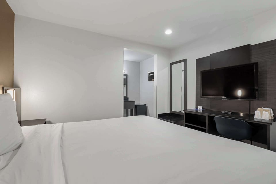 Desk, laptop workspace, blackout drapes, soundproofing