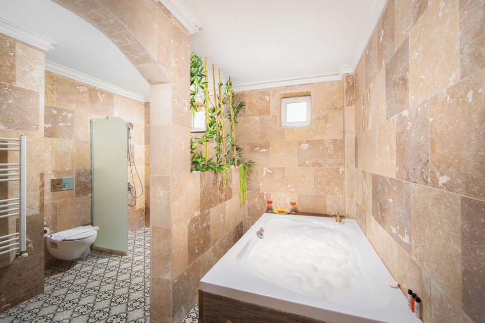 Phobos | Bathroom | Designer toiletries, hair dryer, bathrobes, slippers