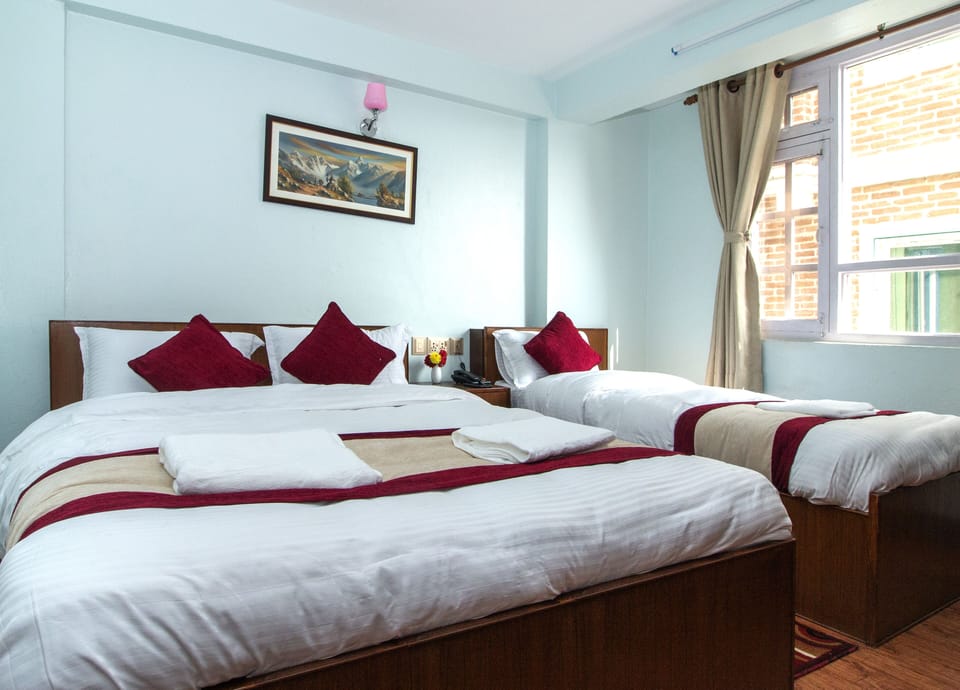Deluxe Triple Room | Desk, free WiFi