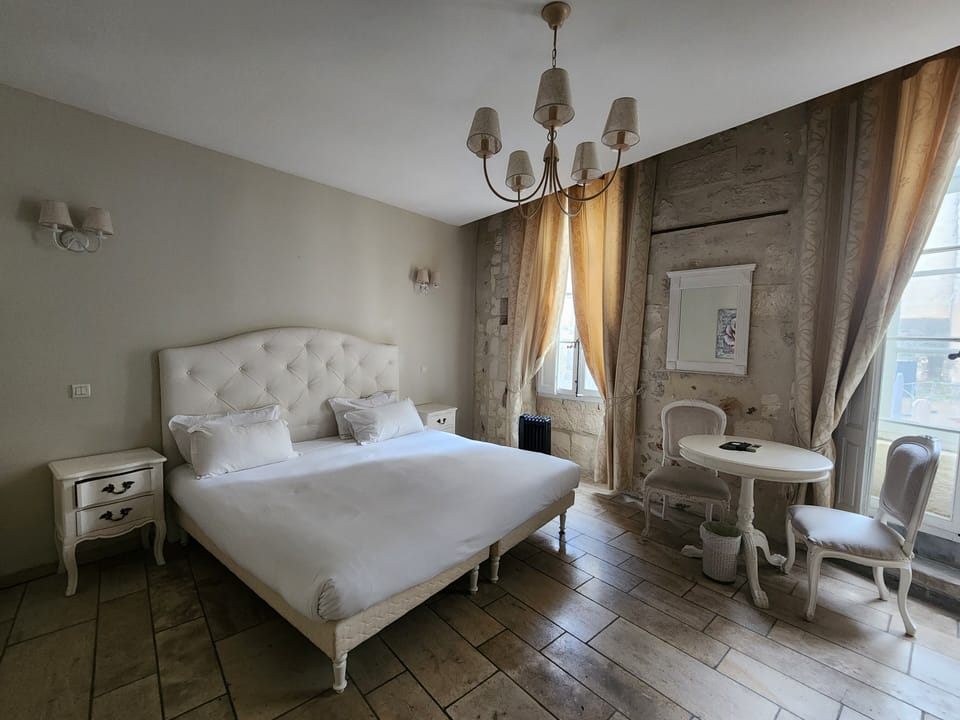 Chambre Supérieure Sofa | Premium bedding, blackout drapes, soundproofing, iron/ironing board