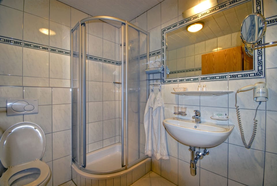 Shower, free toiletries, hair dryer, bathrobes