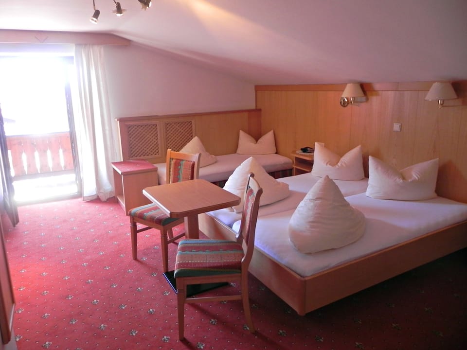 Triple Room | Premium bedding, in-room safe, desk, free cribs/infant beds