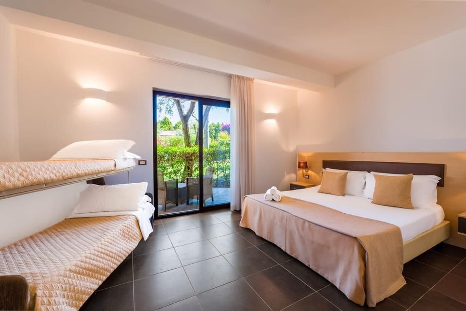 Quadruple Room | Minibar, in-room safe, desk, cribs (surcharge)