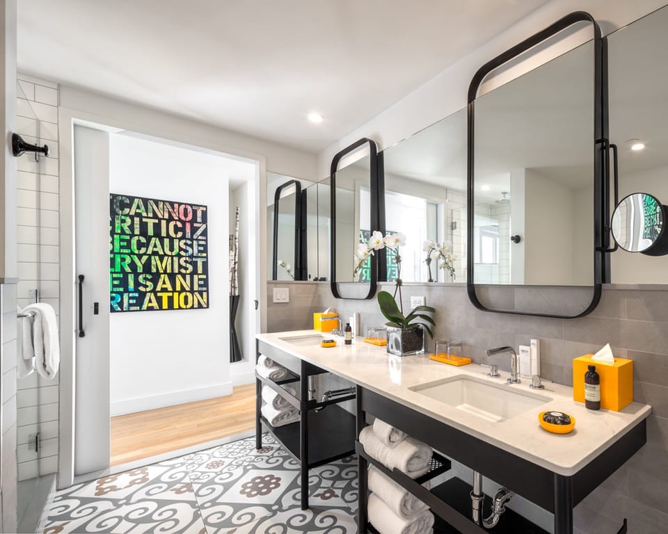 Designer toiletries, hair dryer, towels, soap