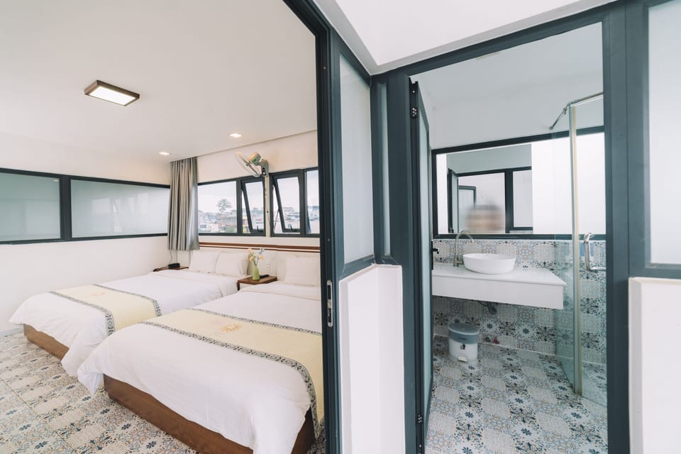 Deluxe Quadruple Room | Premium bedding, down comforters, memory foam beds, desk