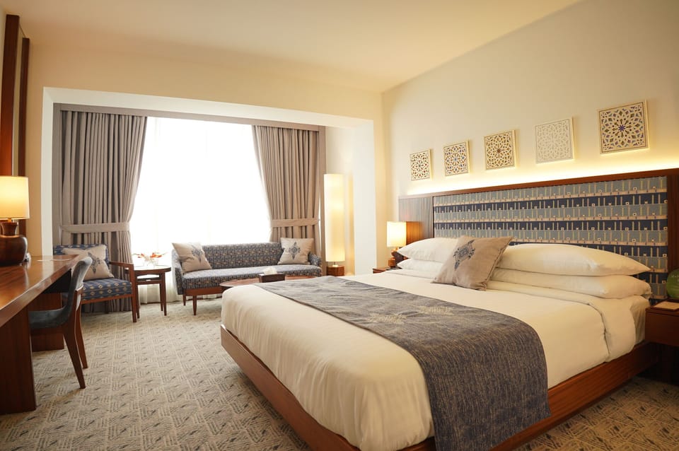 Executive Room | Minibar (free items), in-room safe, iron/ironing board (on request)