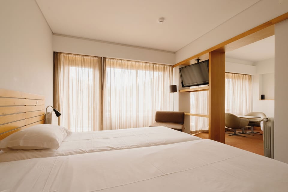 Family Suite, Garden View | Desk, free WiFi, bed sheets