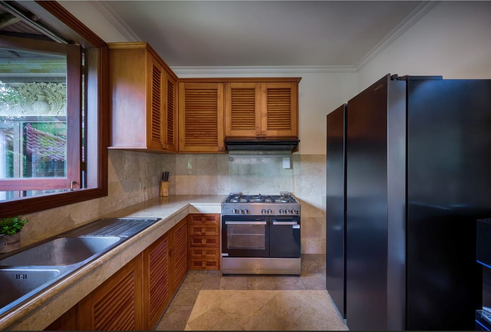 Luxury Villa, 5 Bedrooms, Garden View | Private kitchen | Electric kettle, cleaning supplies