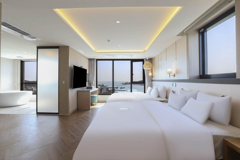 Signature Suite, 2 Double Beds, Sea View | Premium bedding, free WiFi, bed sheets