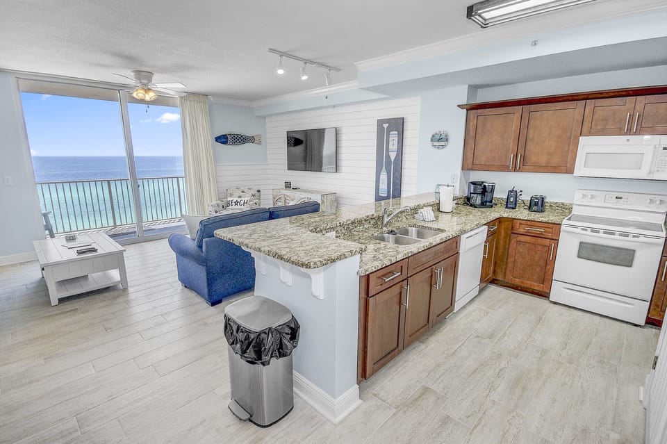 Condo, Multiple Beds, Balcony, Ocean View | Private kitchen | Fridge, microwave, oven, stovetop
