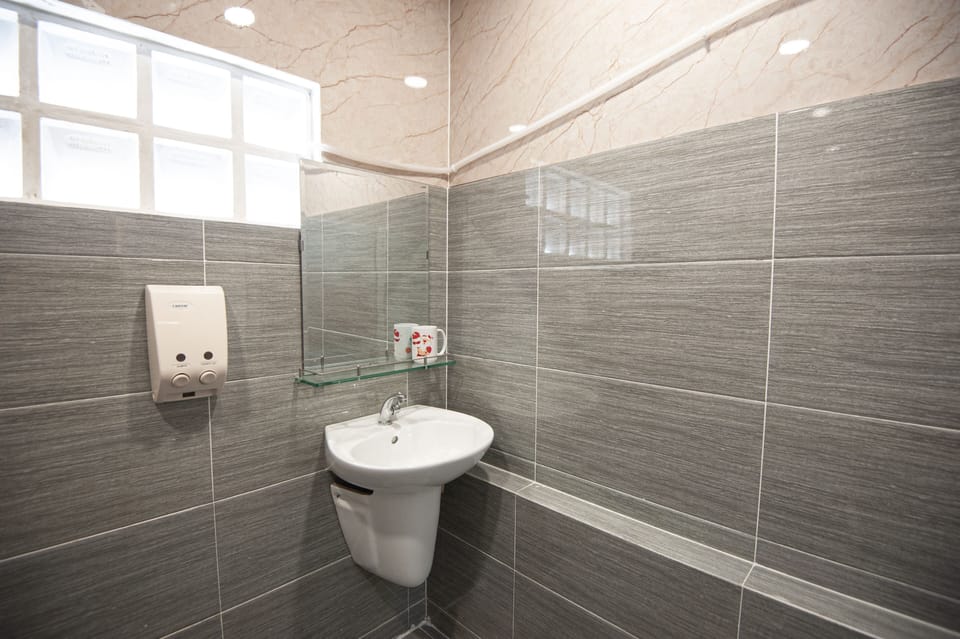 Basic Shared Dormitory, Balcony | Bathroom | Shower, bidet, towels