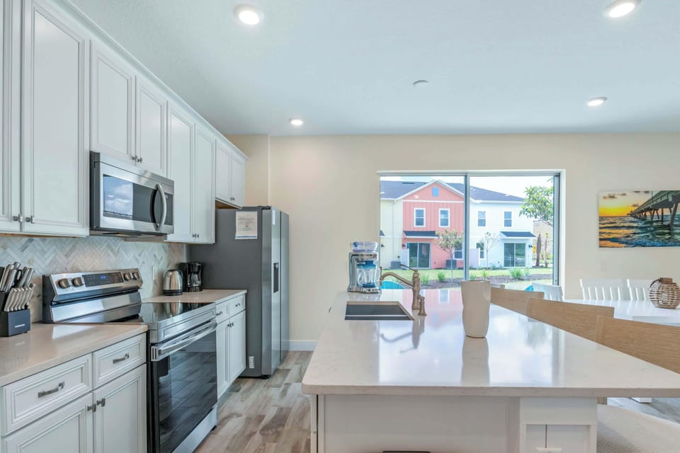 Townhome, Multiple Beds, Patio, Garden View (Turquoise Breeze) | Private kitchen | Coffee/tea maker, fridge, microwave, oven