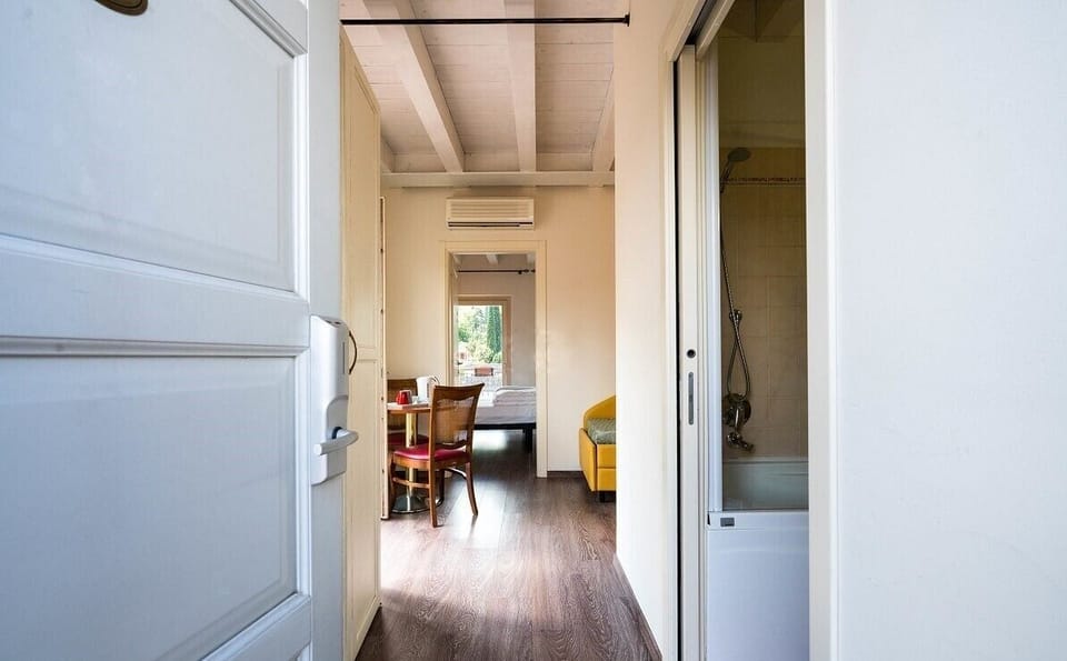 Monte Baldo Room | Minibar, in-room safe, blackout drapes, iron/ironing board (on request)
