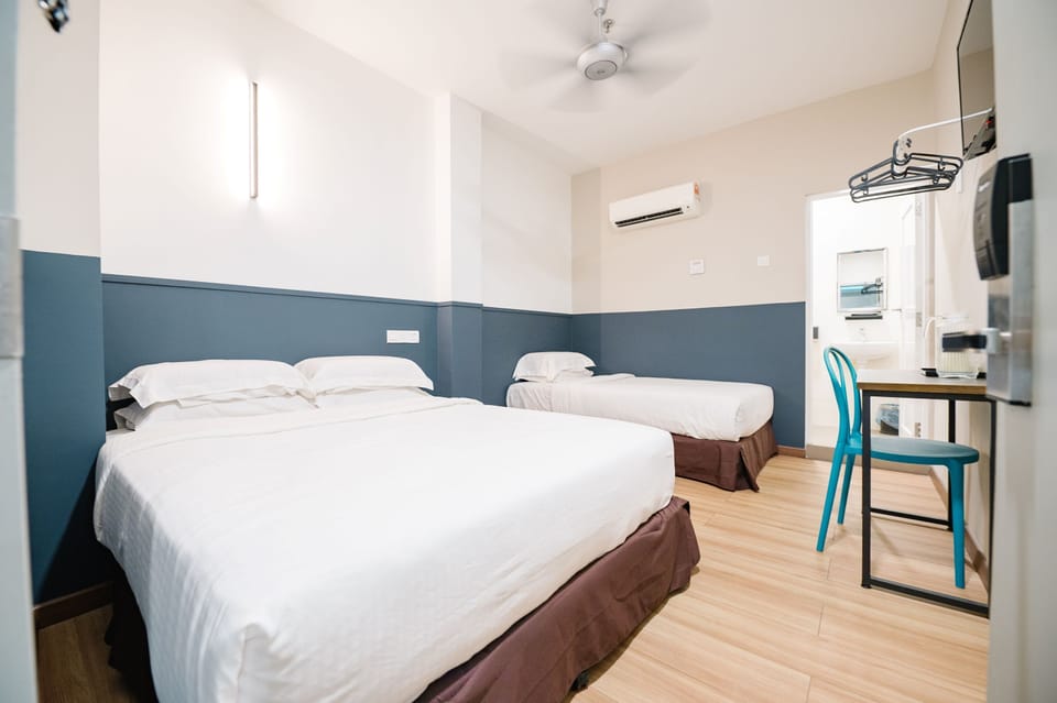 Triple Room, No Windows | Desk, WiFi (free), bed sheets