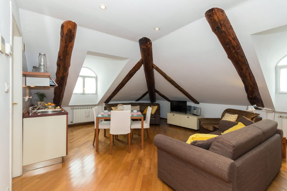 Loft, 1 Bedroom | Living area | 35-inch TV with digital channels