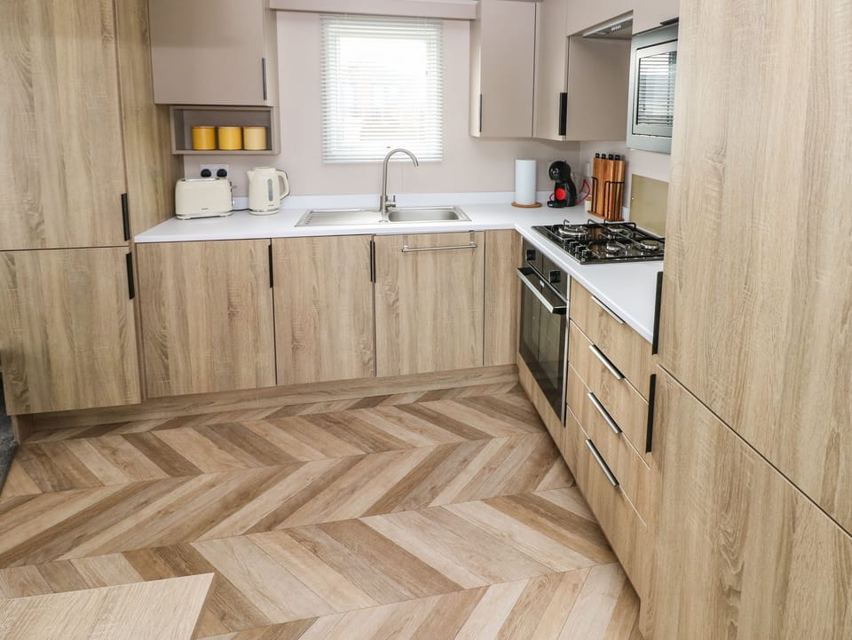 Fridge, electric kettle, toaster, cookware/dishes/utensils